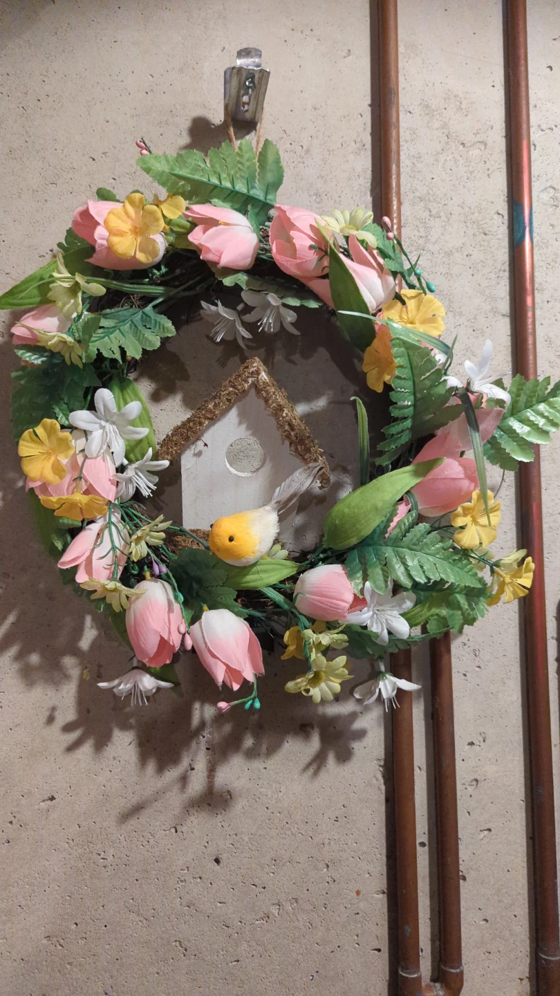 Floral wreath with birdhouse