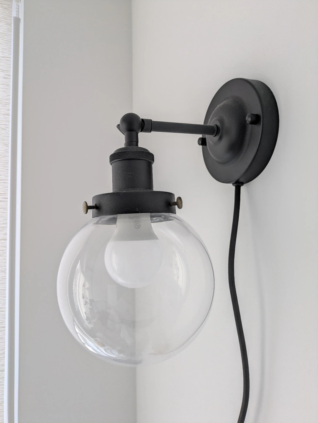 Black Globe Wall Sconce Lamp with Clear Glass Shade
