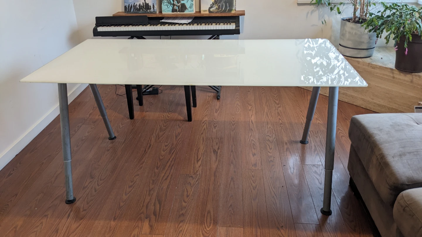 Glass top dining table