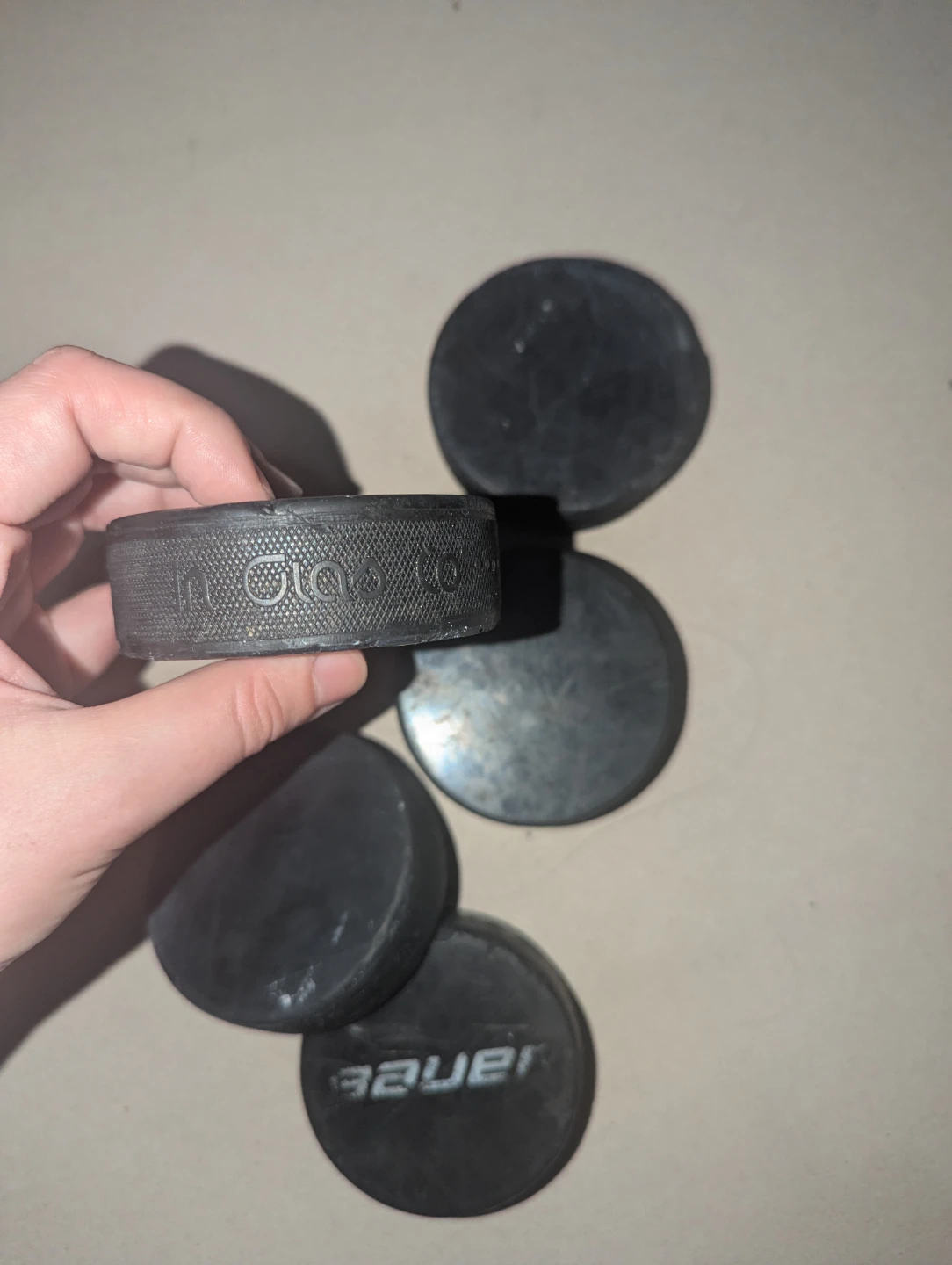 Used Bauer Hockey Pucks (Set of 5) - photo 2
