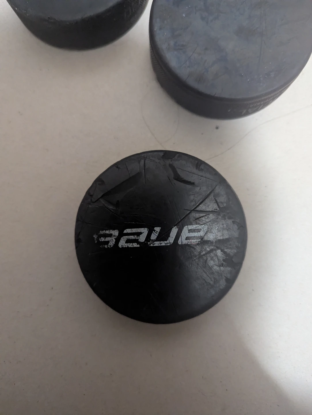 Used Bauer Hockey Pucks (Set of 5) - photo 3