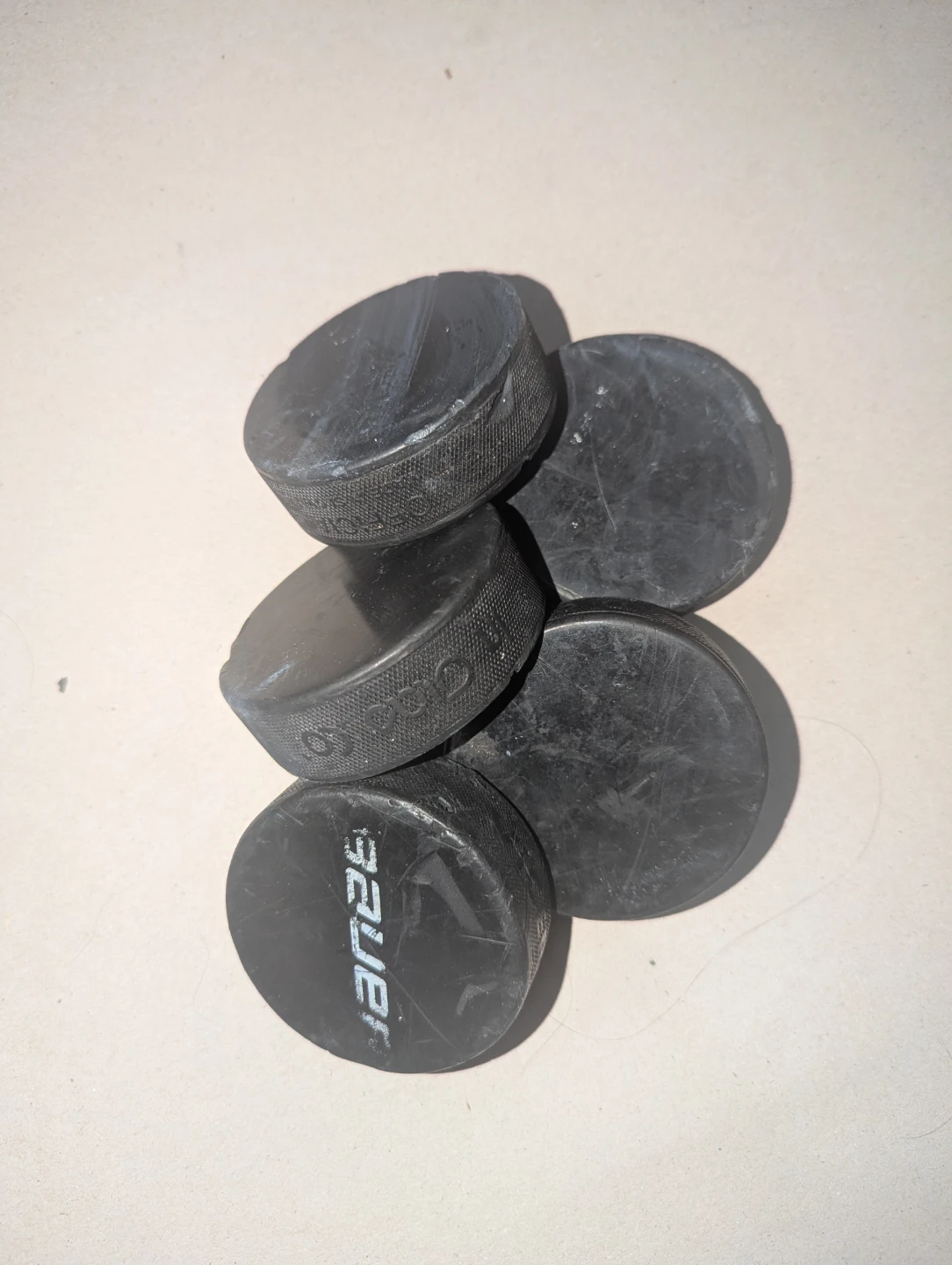Used Bauer Hockey Pucks (Set of 5) - photo 4