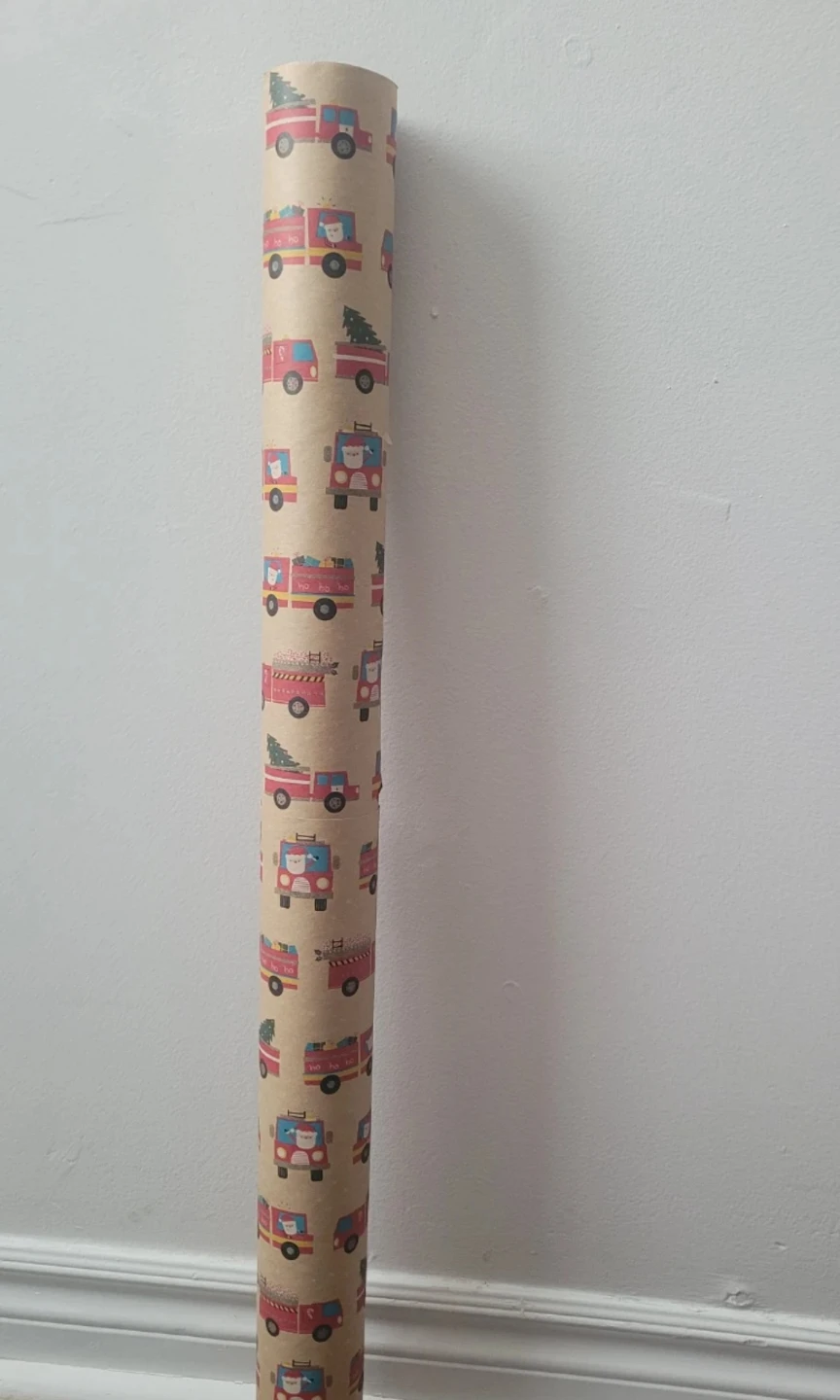 Roll of Wrapping Paper with Fire Trucks and Santa