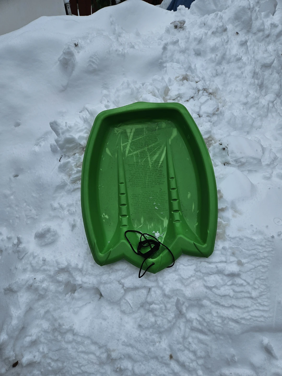 Green Plastic Toboggan Sled