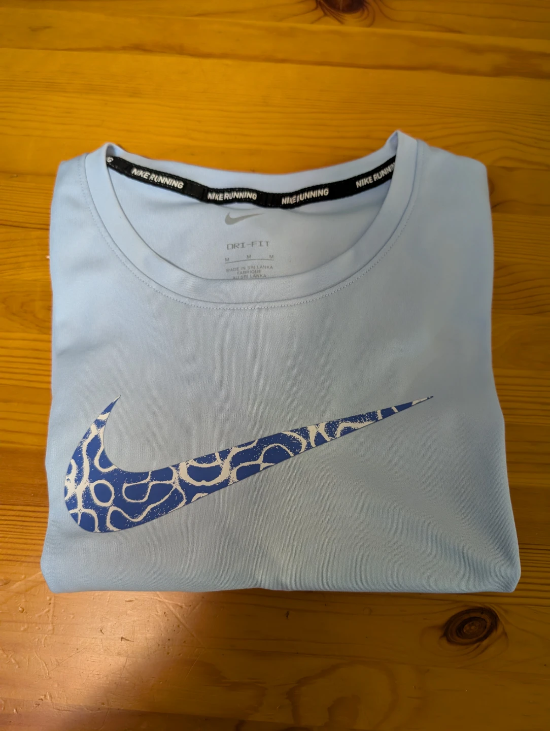 Nike Blue womenseDri-FIT Running Shirt - Size M