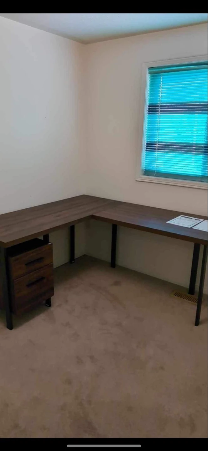 L-Shaped Brown Wood Desk with Drawers