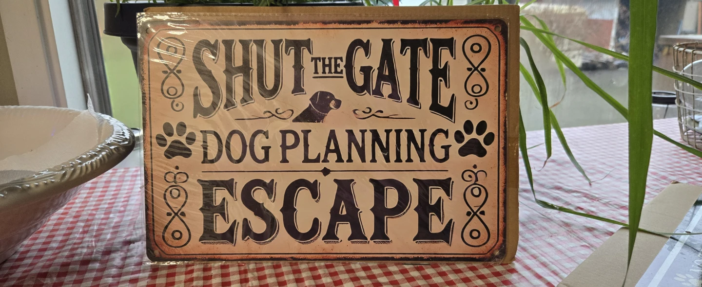Shut the Gate Dog Planning Escape Sign