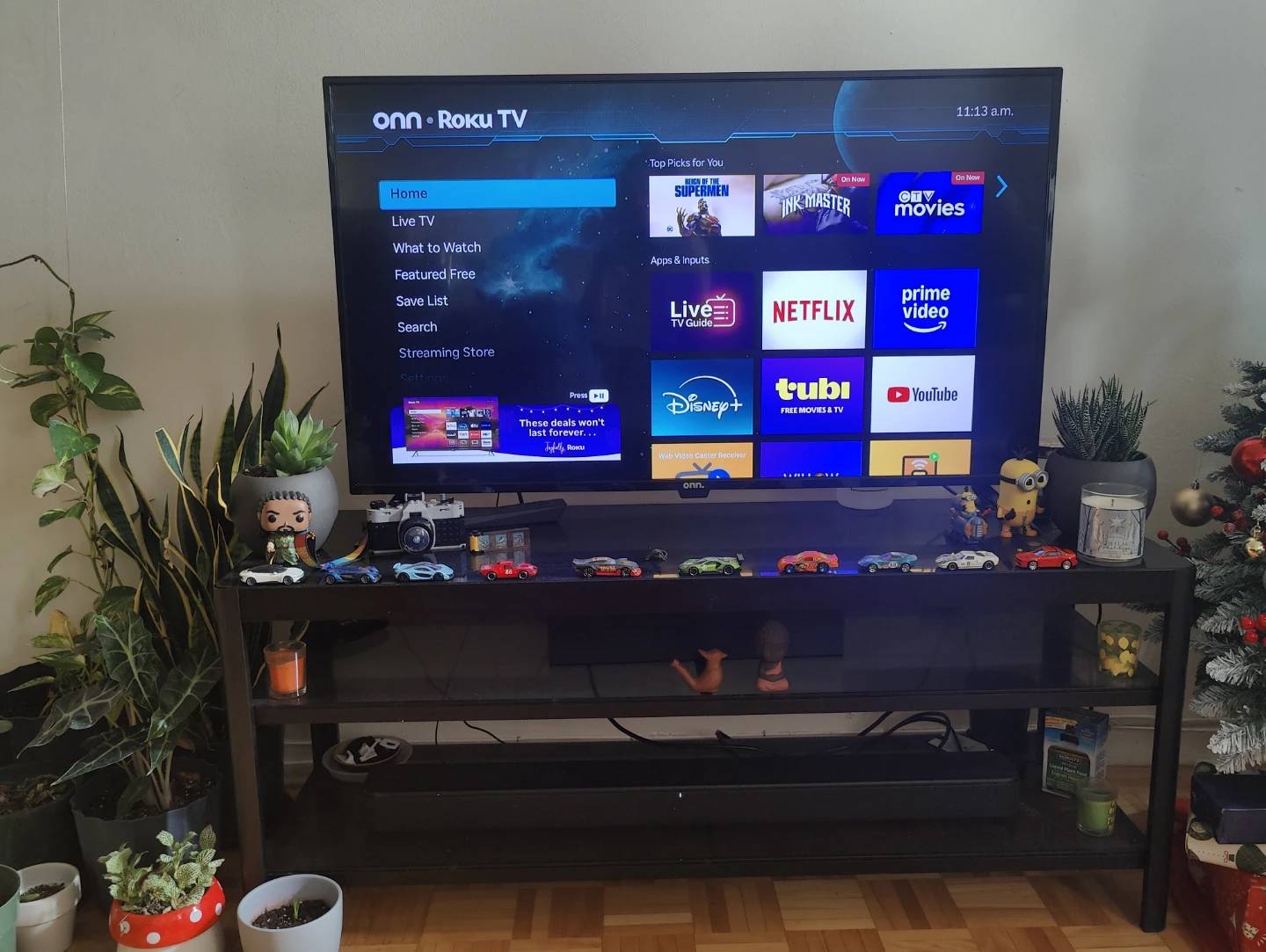 onn. Roku TV + TV stand + Sony Soundbar