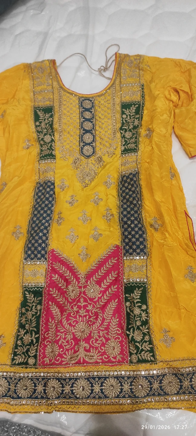 Yellow Embroidered Kurti with Pink and Green Accents
