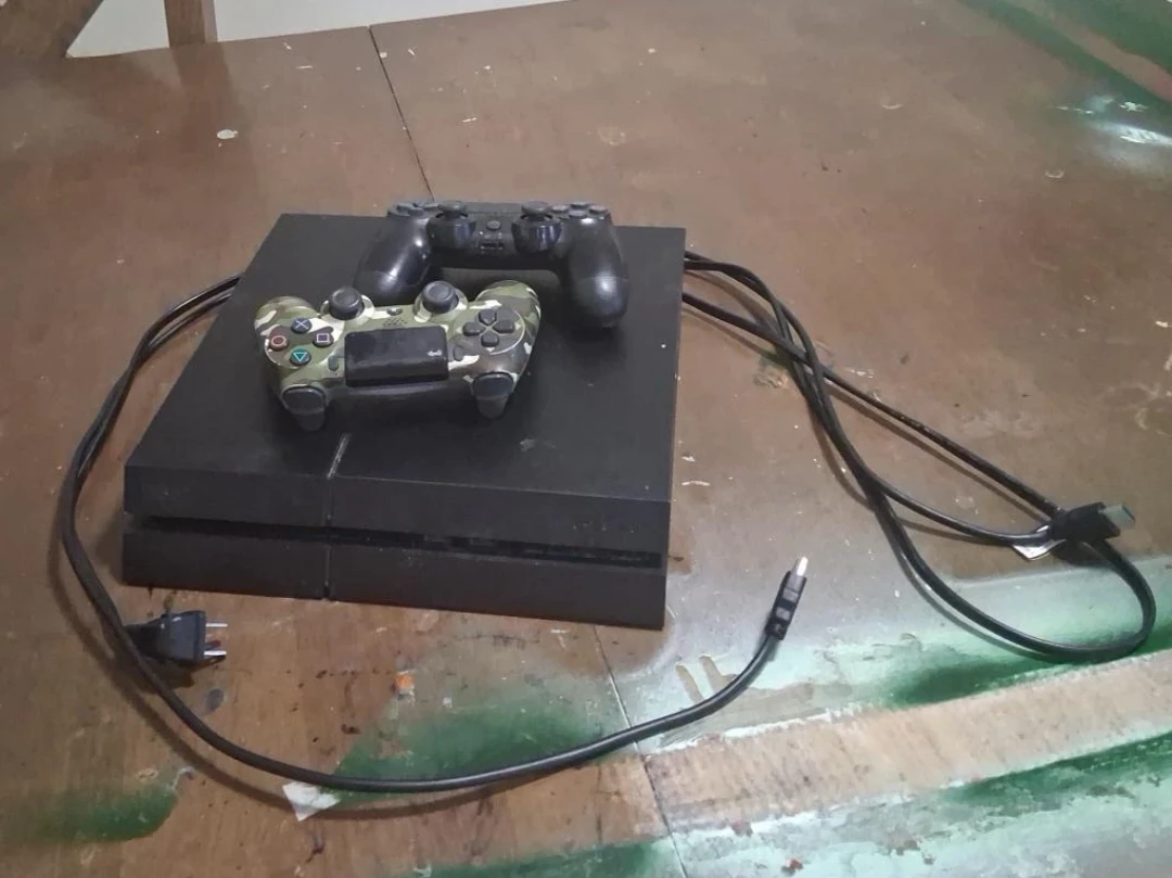 Sony PlayStation 4 Console with 2 Controllers