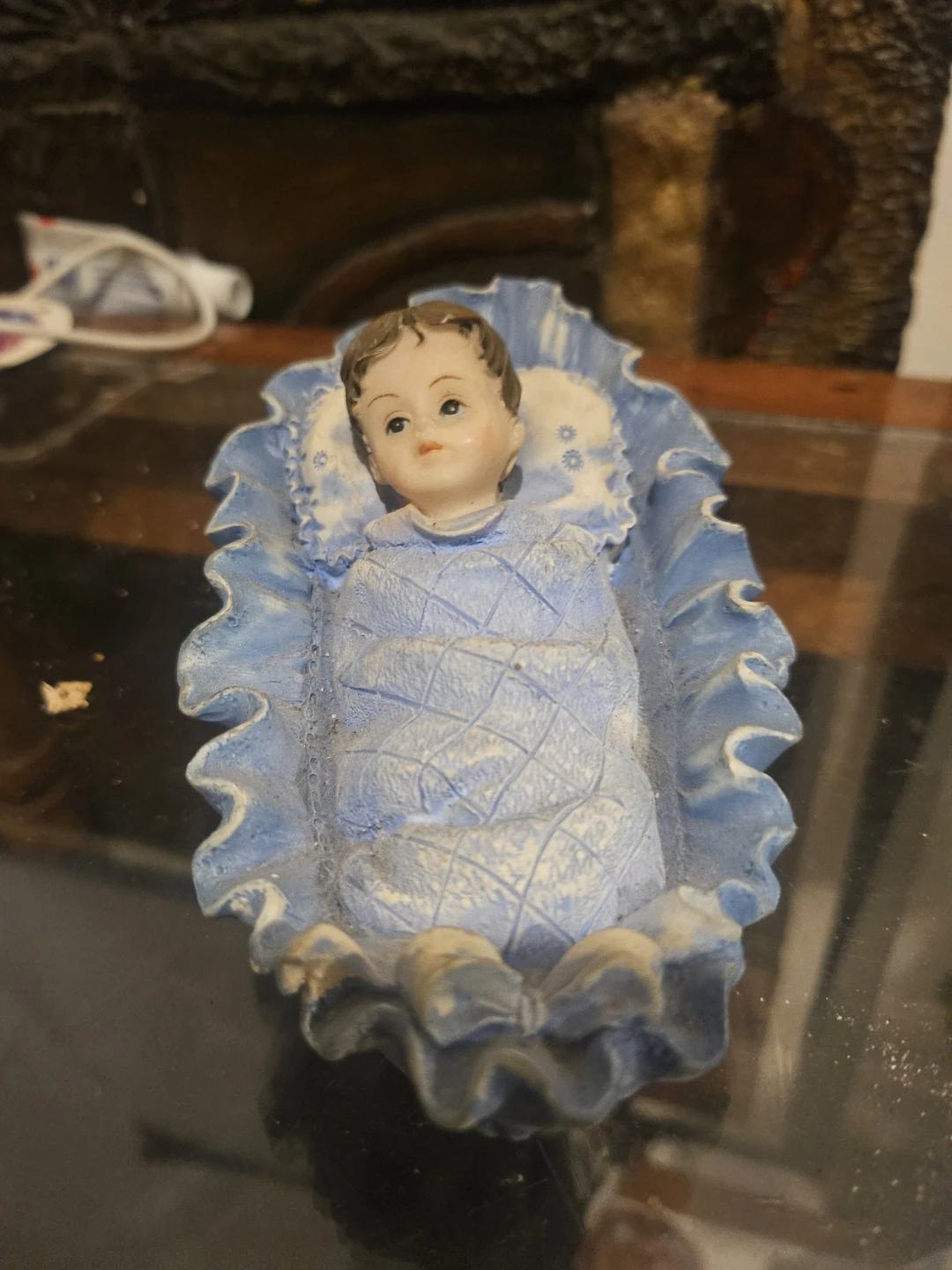 Figurine of Baby in Blue Blanket