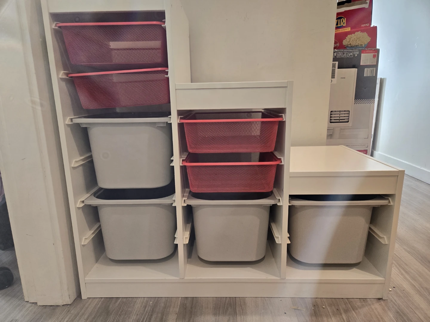 White Storage Unit with Bins and Baskets