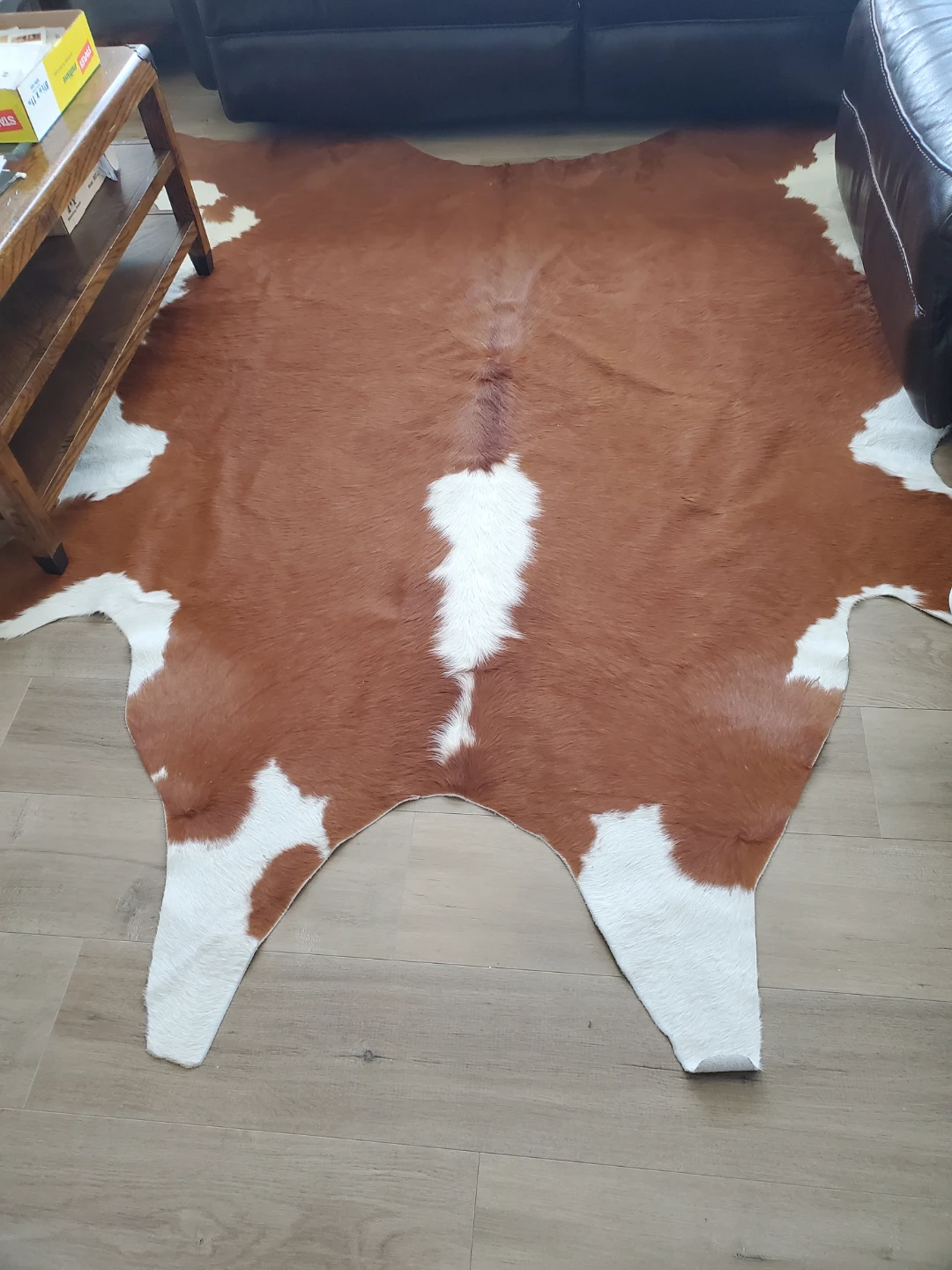 Brown and White Cowhide Rug