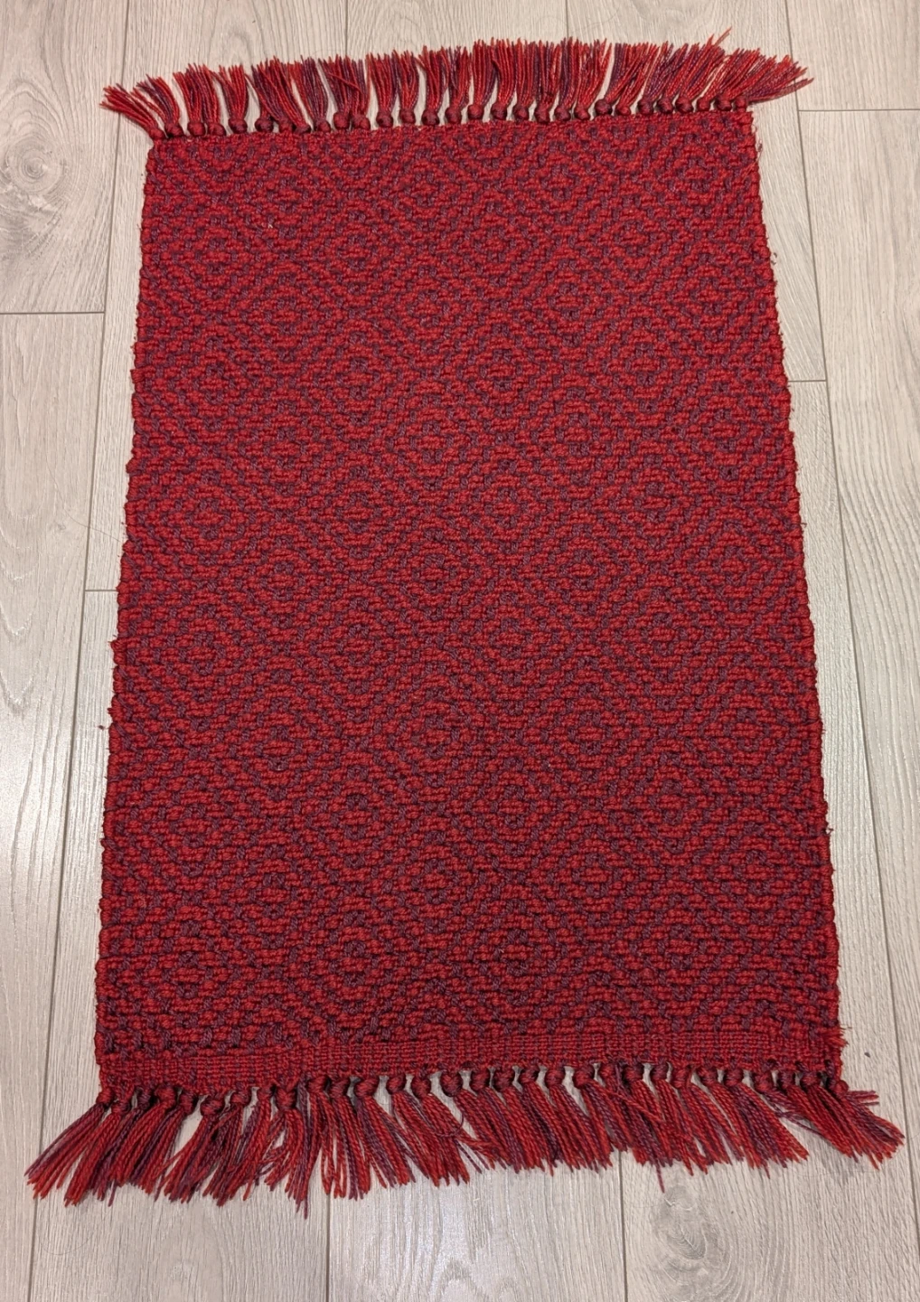 Small Red Woven Rug with Tassels