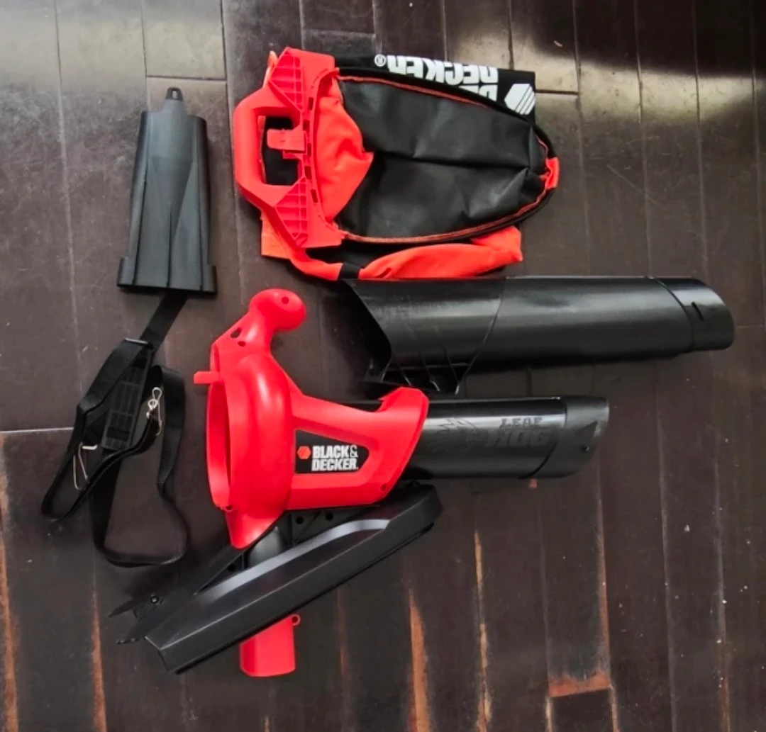 some parts of a Black & Decker Leaf Blower Vac with Mulcher Bag