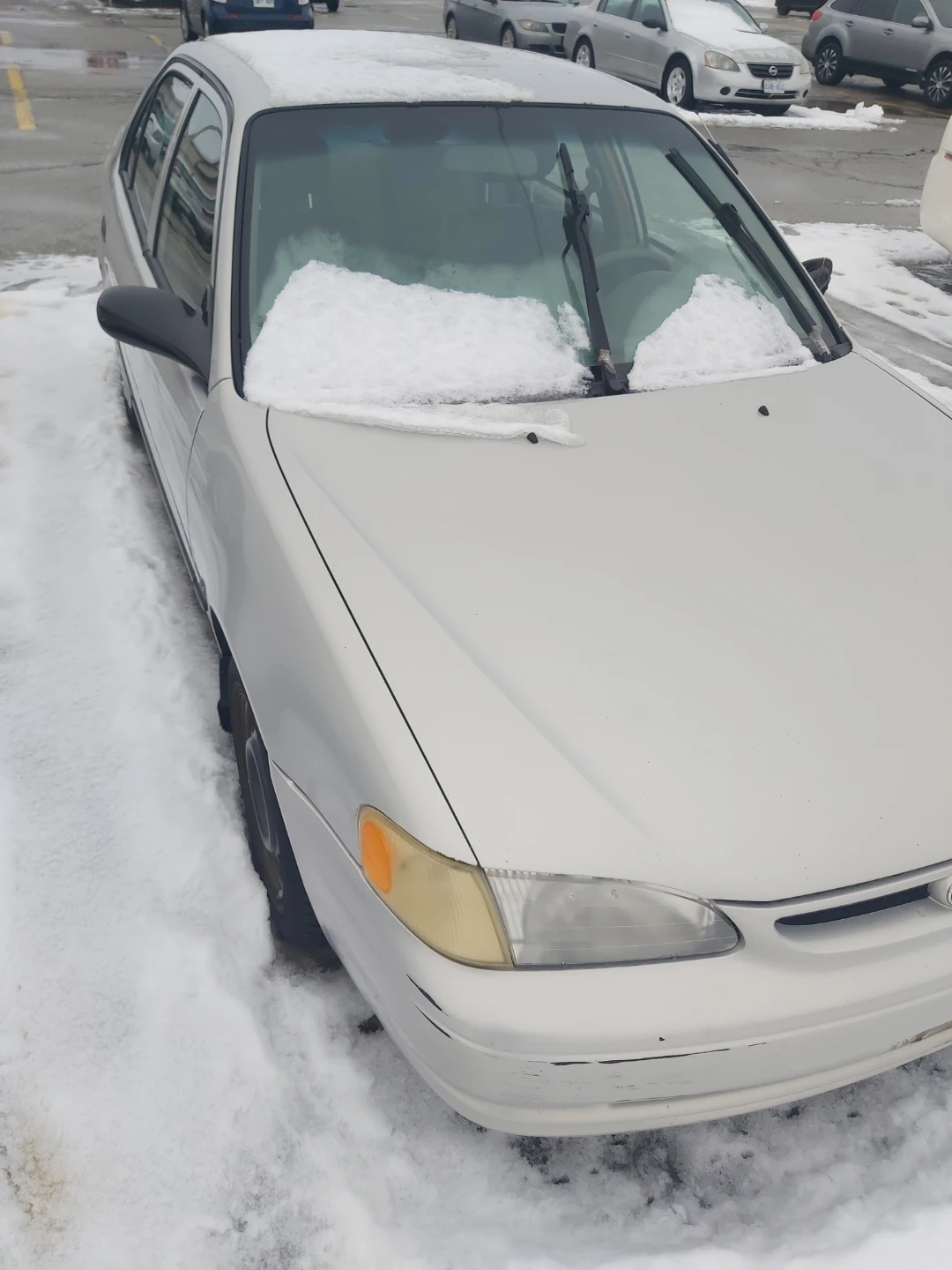 Toyota Corolla - Silver Sedan - photo 3