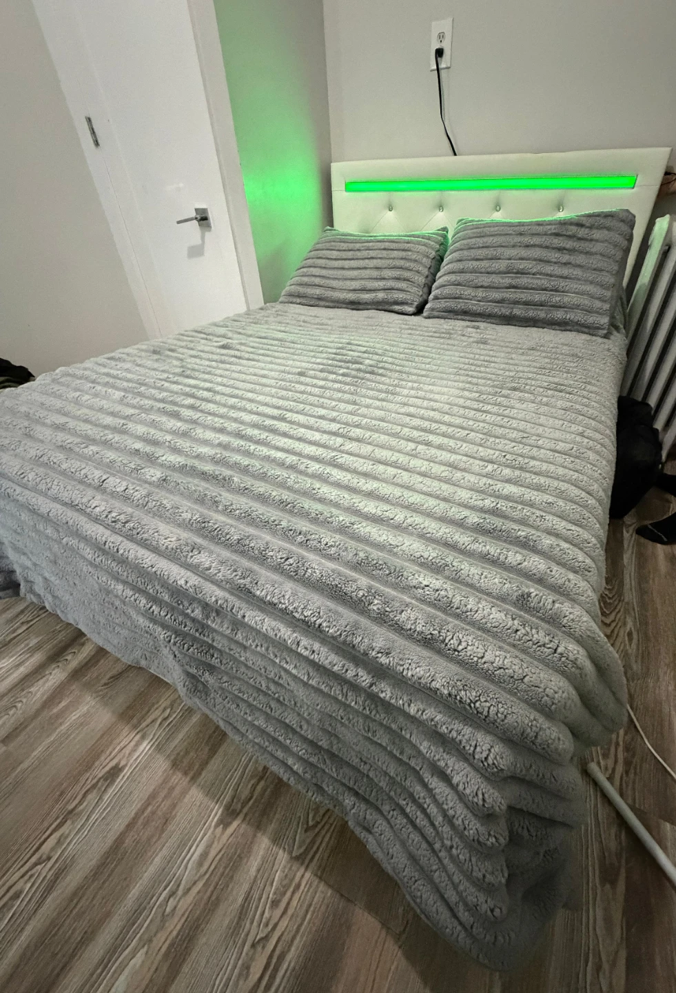Bed frame with LED lights and a nearly new mattress.