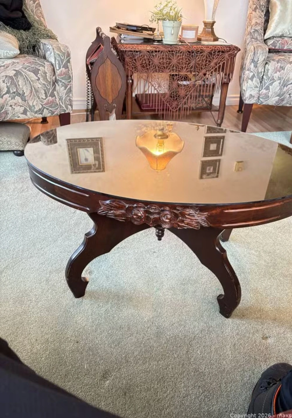 Oval Coffee Table with Mirrored Top and Carved Wood Base