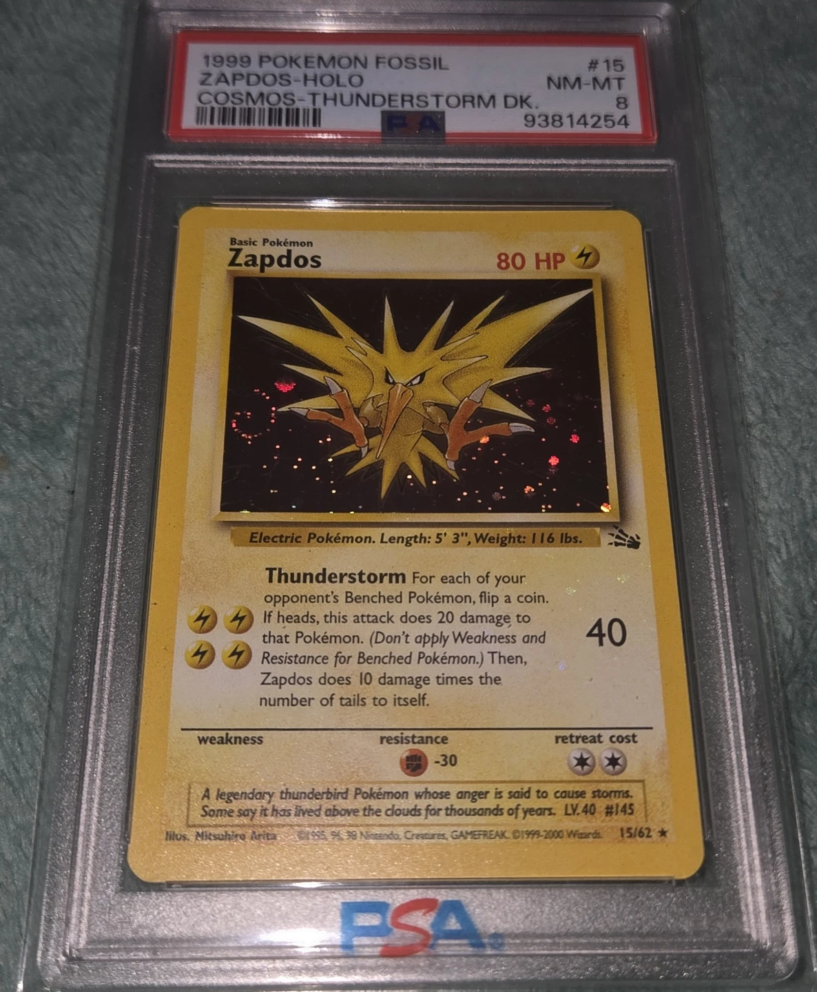 Pokemon Zapdos PSA 8 Fossil Cosmos-Thunderstorm Zapdos Holo