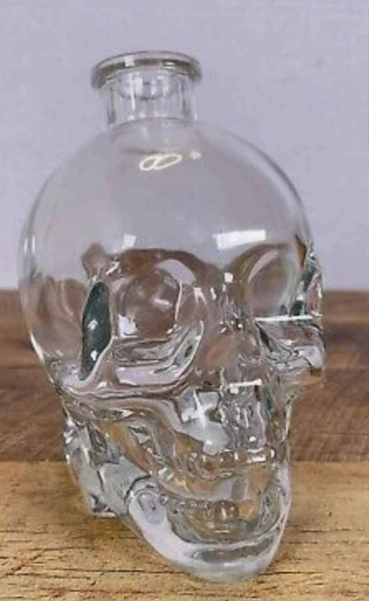SKULL SHAPED GLASS BOTTLE - $20 EACH!!