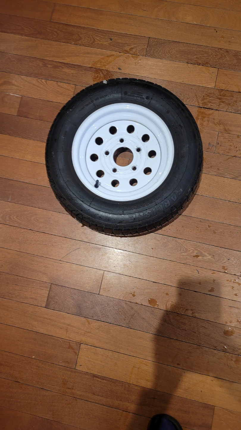 Trailer Tire with White Rim