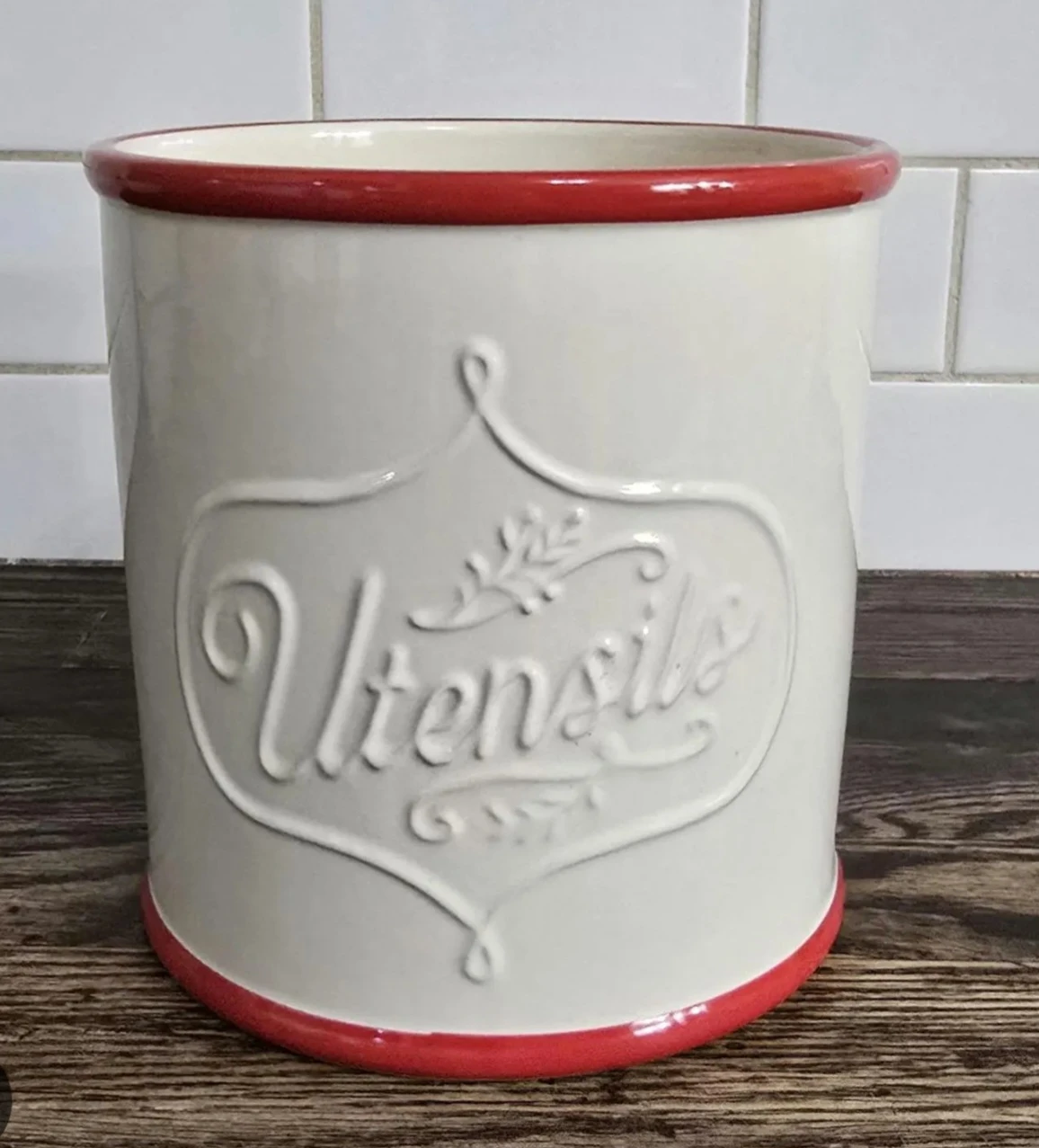 Pioneer Woman white and red ceramic utensil holder.