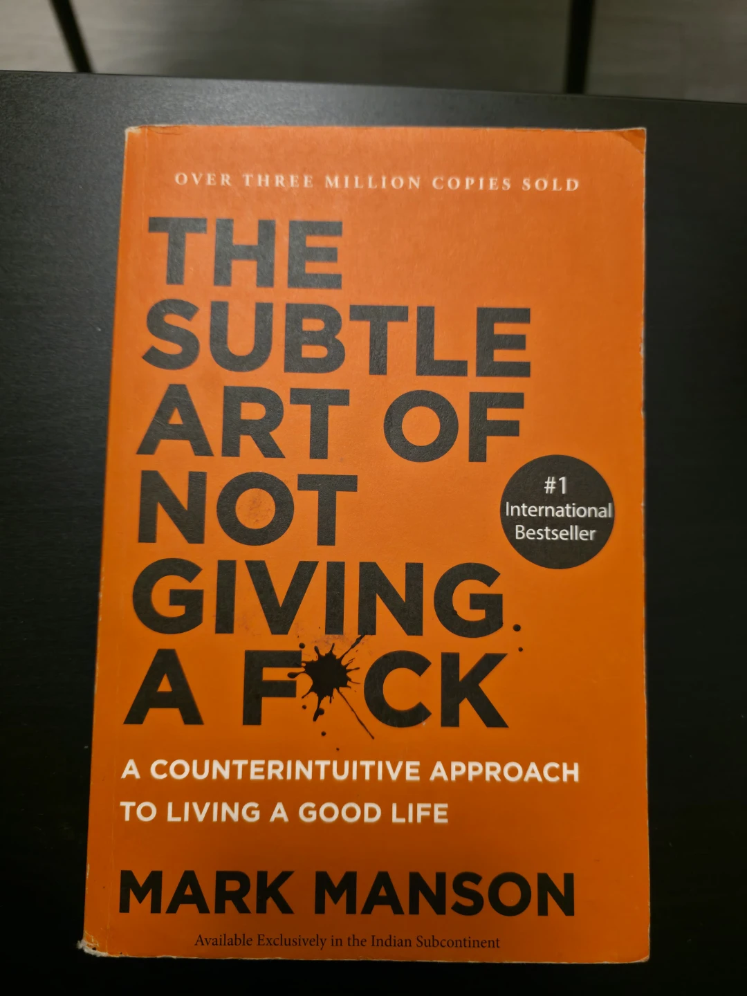 "The Subtle Art of Not Giving a F*ck" by Mark Manson