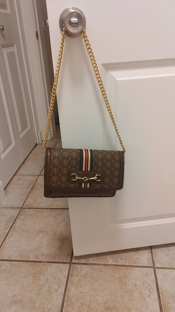 Brown patterned shoulder bag with gold chain