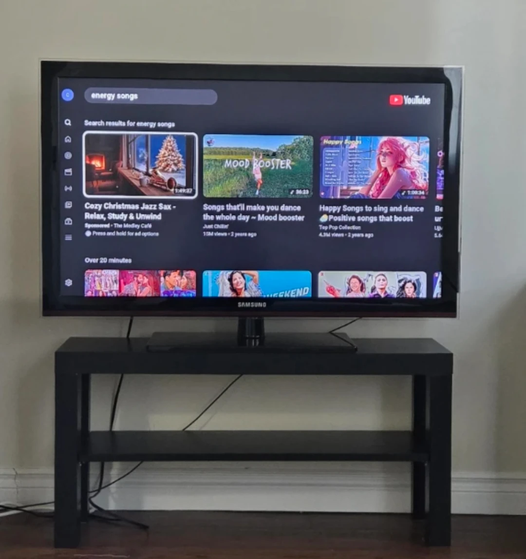 Samsung TV on Black TV Stand