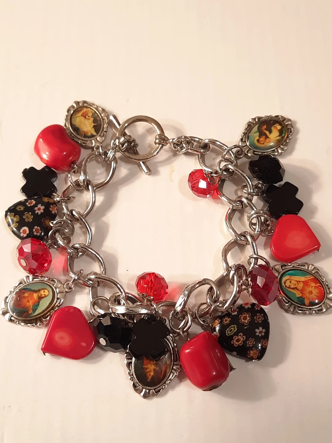 Charm Bracelet with Religious and Heart Charms