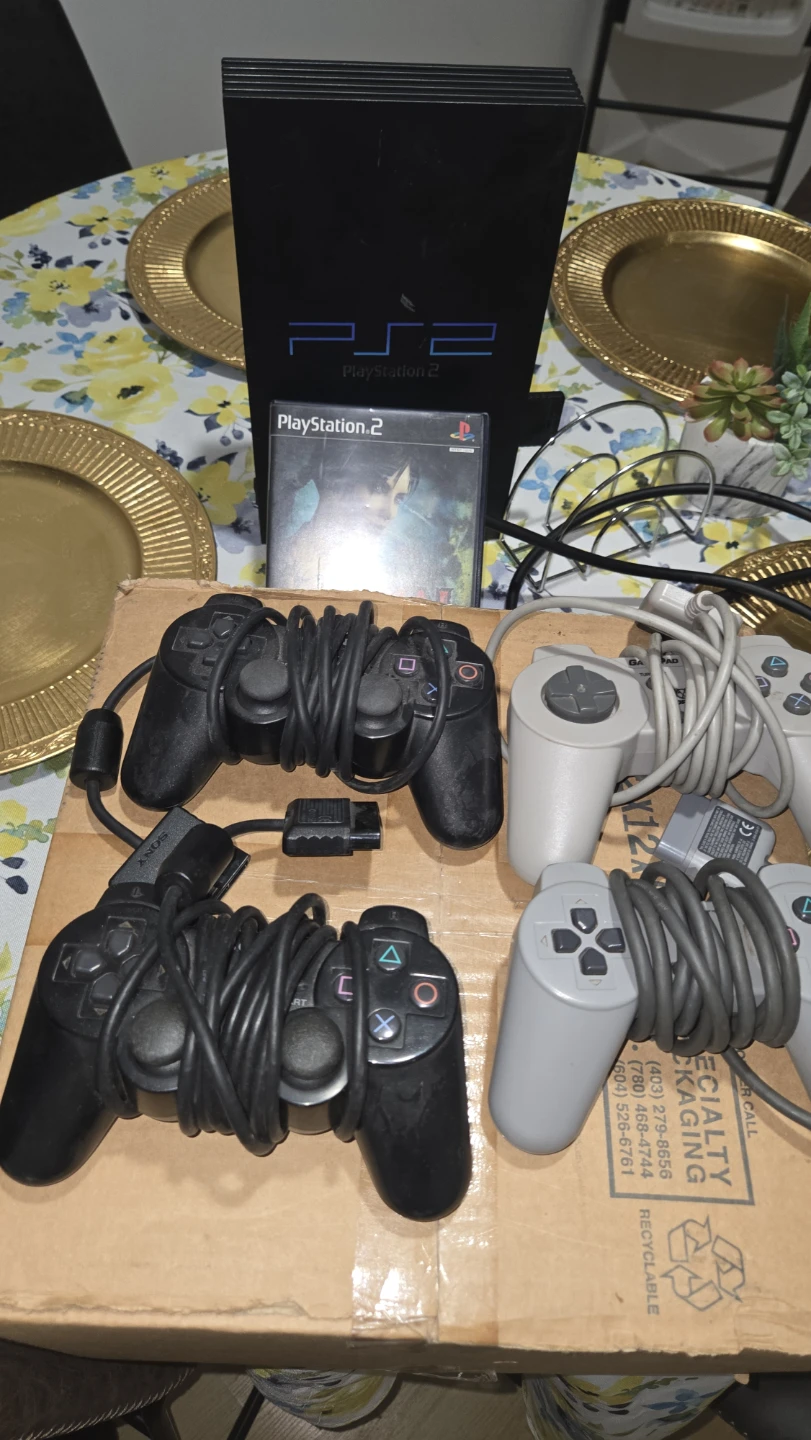 PlayStation 2 Console with Game & Controllers