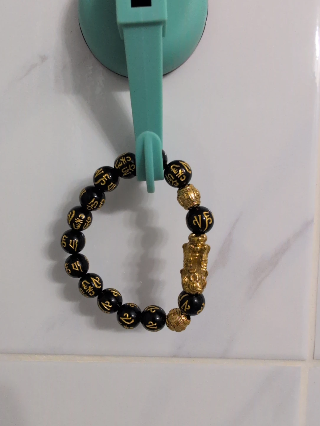 Black Beaded Bracelet with Gold Dragon Charm