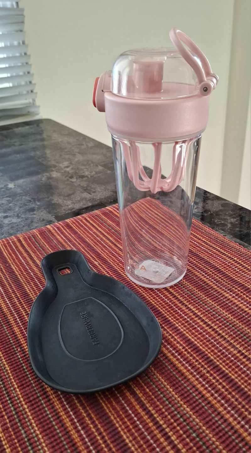 Pink Shaker Bottle and Farberware Spoon Rest