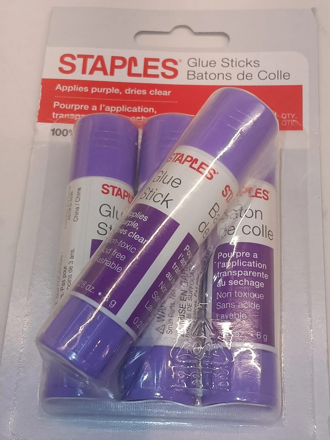 STAPLES Glue Sticks - Applies Purple, Dries Clear