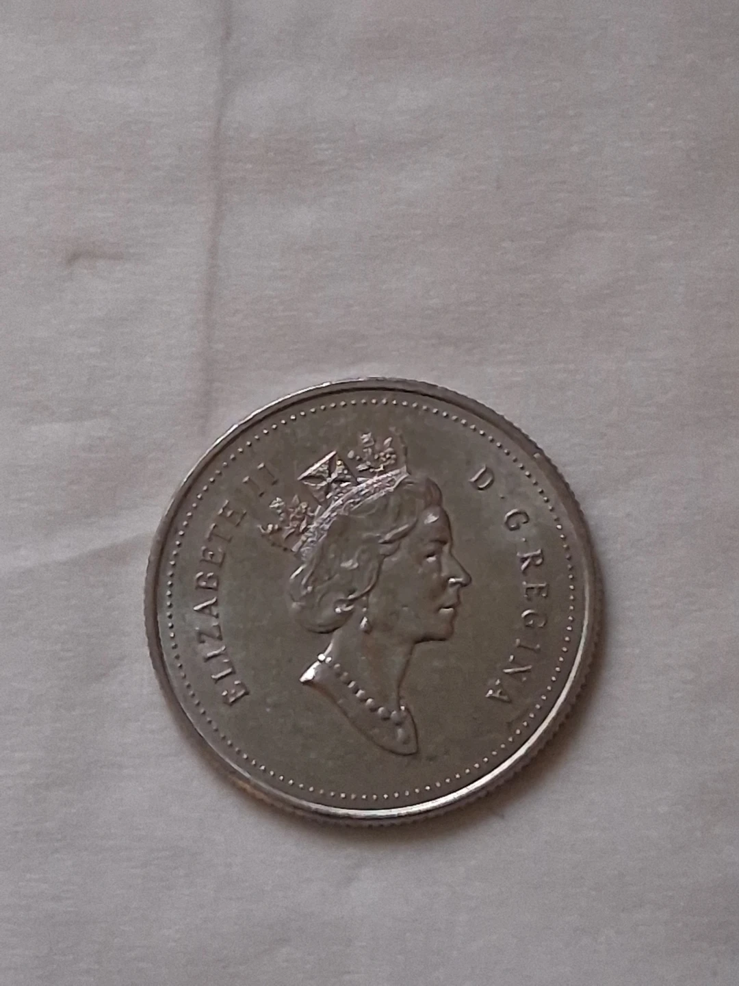 1990 Canadian 25 cents coin - photo 2