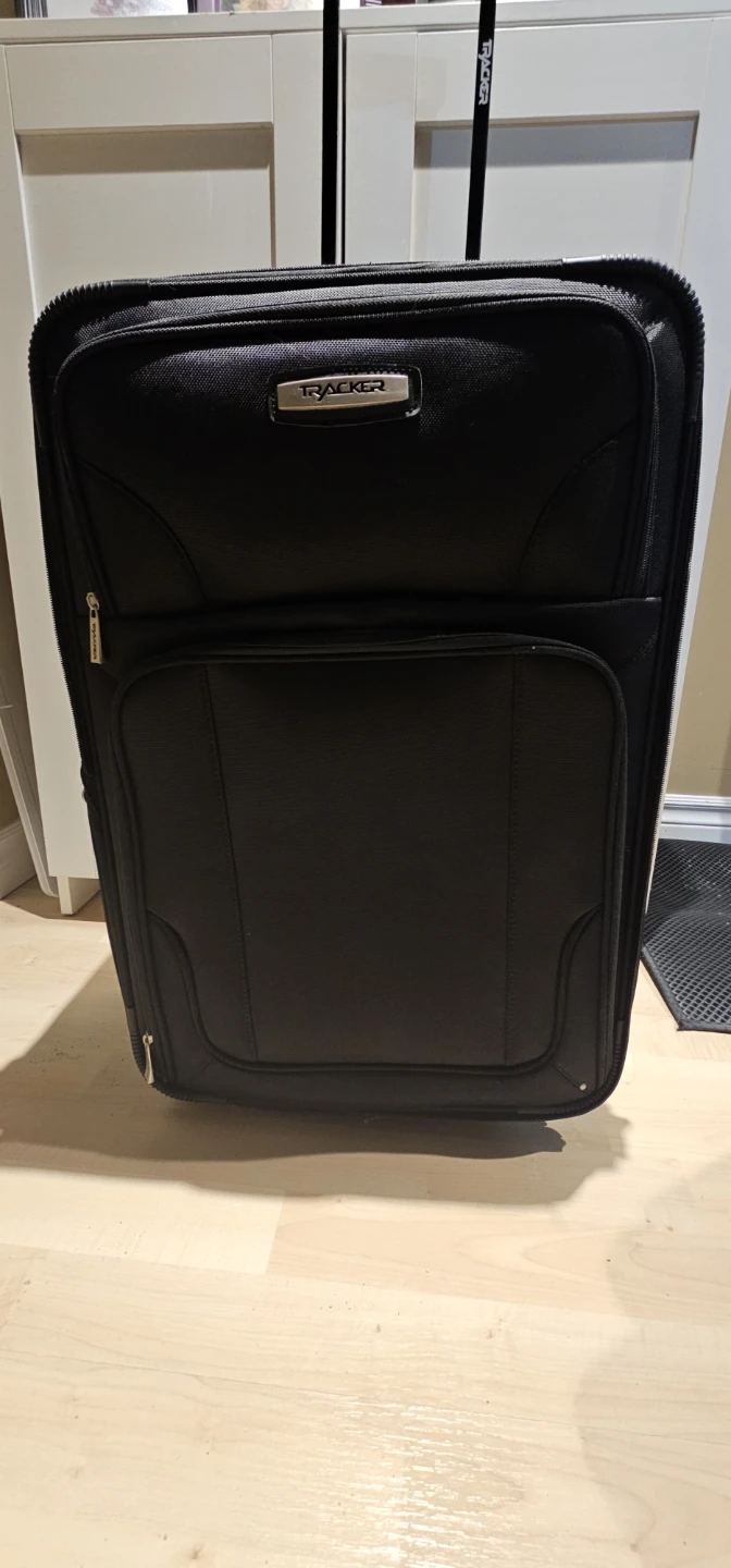 2 Tracker large suitcases
