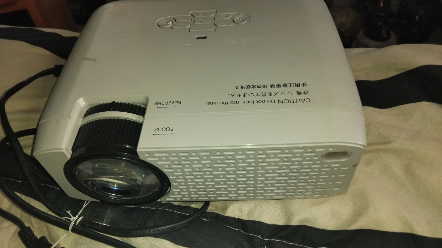 Projector with Keystone and Focus Adjustments