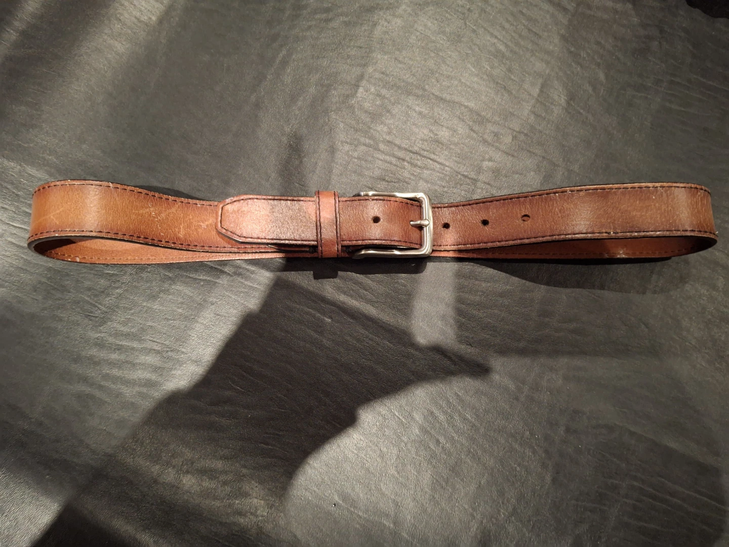 Fossil leather belt