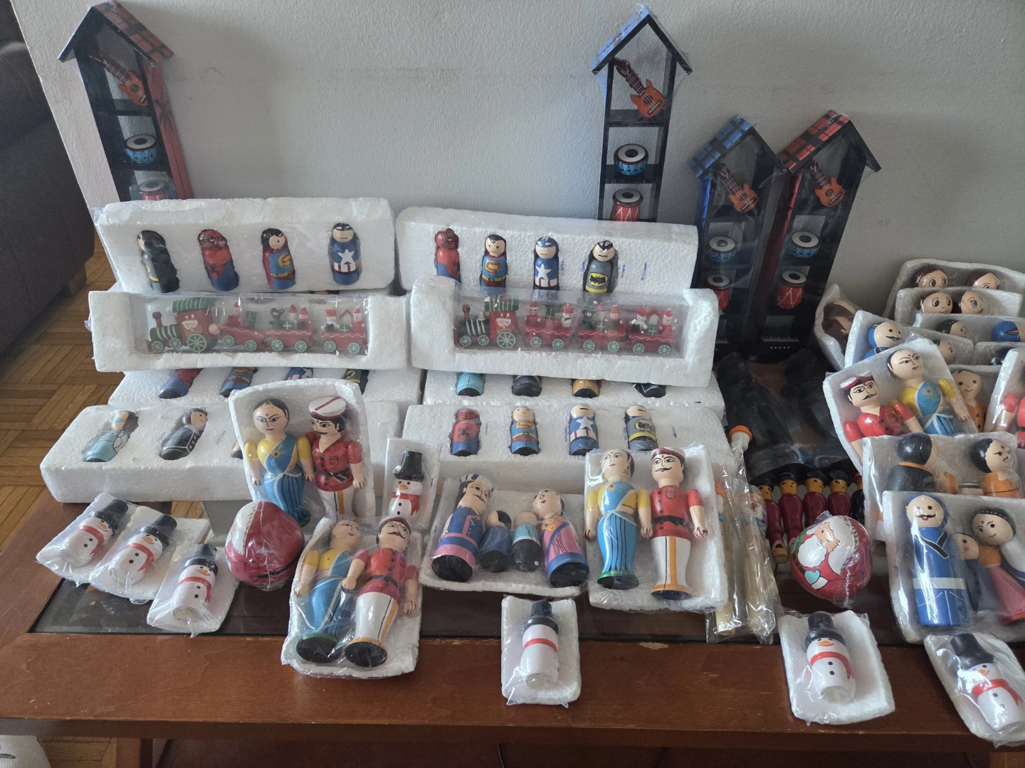 Assorted Wooden Figurines and Trains