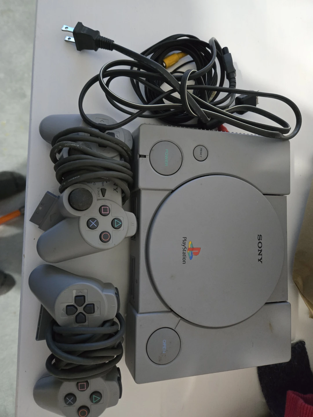 Sony PlayStation Console with 2 Controllers