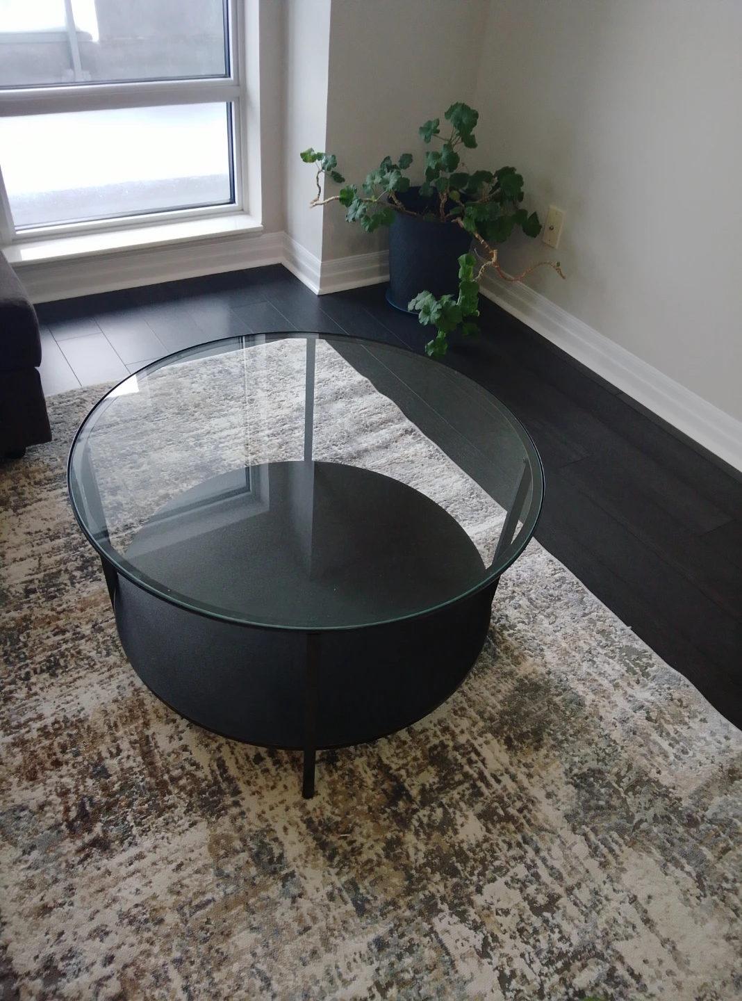 Round Glass Top Coffee Table - Black Base