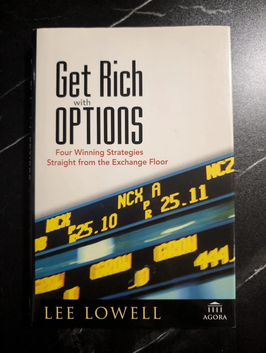 Get Rich with Options by Lee Lowell
