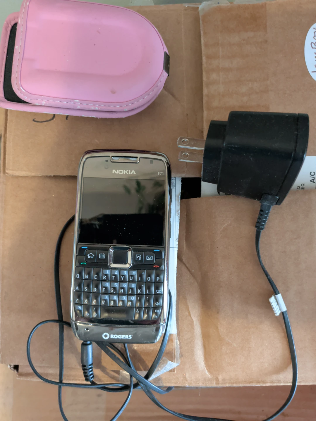 Nokia E71 Cell Phone with Charger and Pink Case