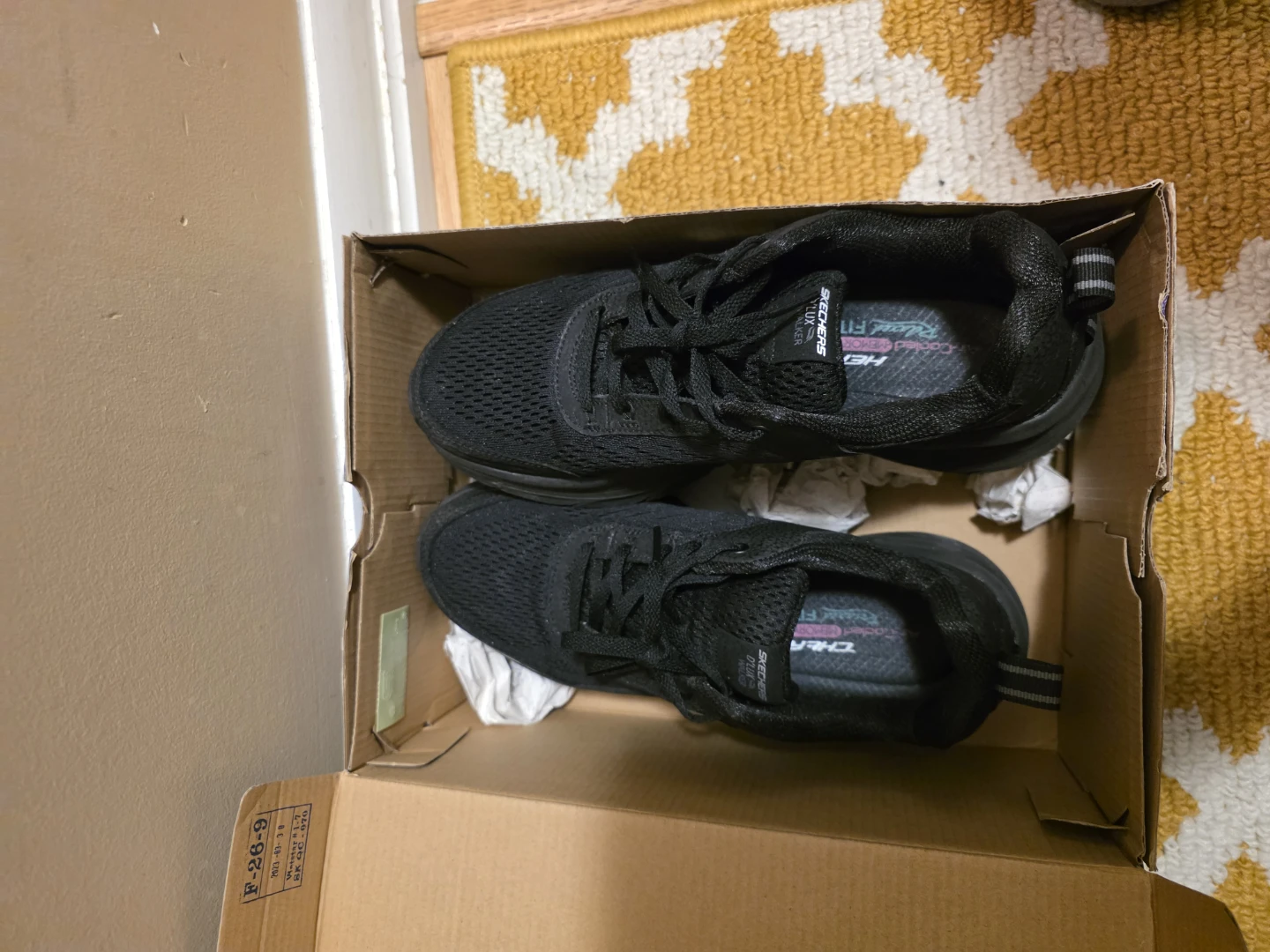 Woman Black Skechers shoes
