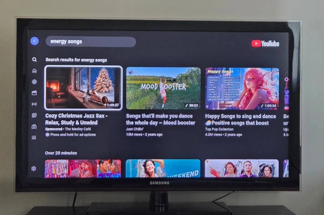 Samsung TV on Black TV Stand - photo 2