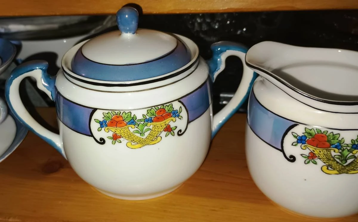 Vintage Teacup and Saucer Set with Creamer, Sugar, and Teapot - photo 3