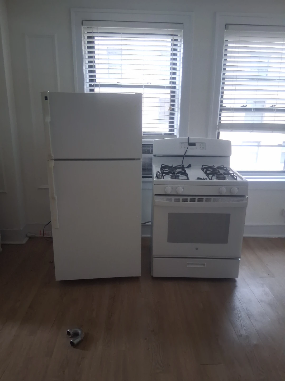 White GE Gas Range and Refrigerator Set