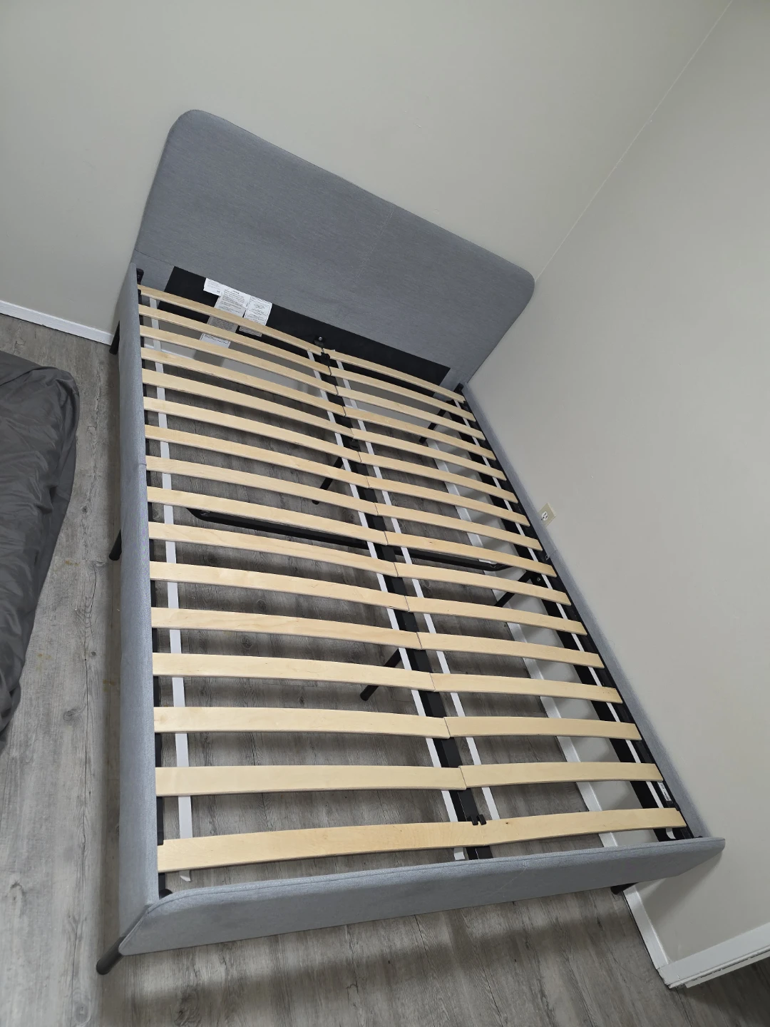 IKEA gray upholstered bed frame
