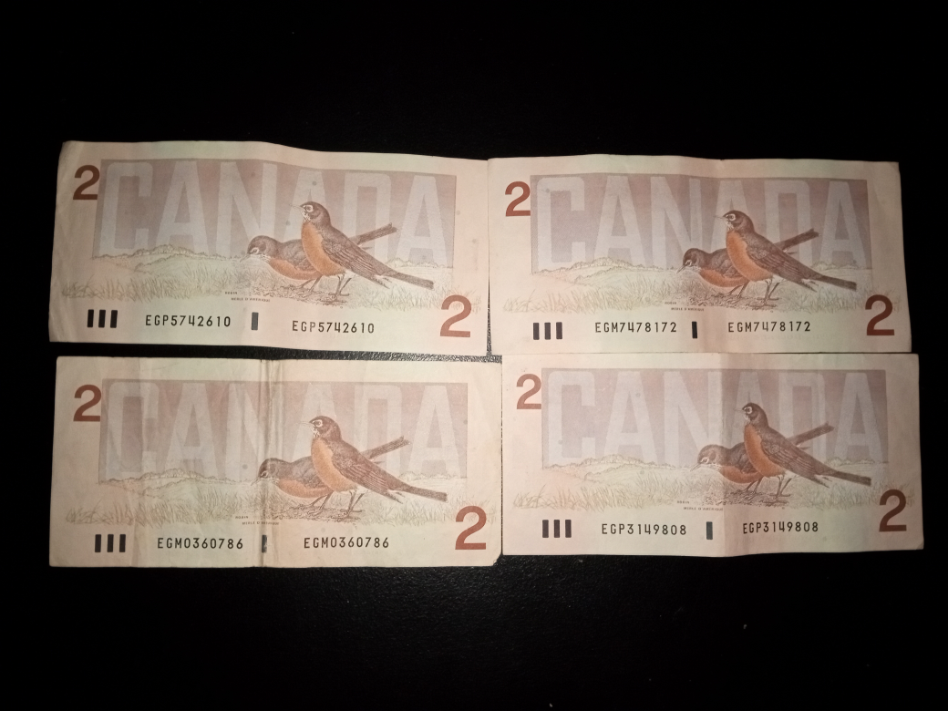 Four Canadian $2 Bills (1986) - photo 2