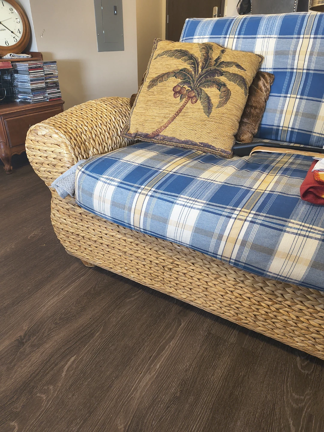 Wicker Sofa with Blue Plaid Cushions